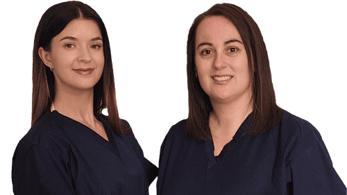 A photograph of the fliss co-founders, Lydia and Ashlea in navy blue medical scrubs.